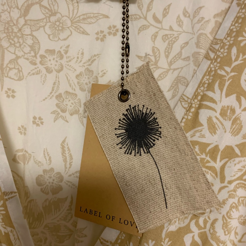 Beautiful beige and white dress Label Of Love.